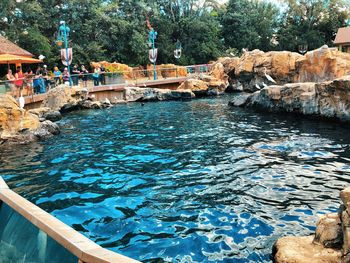 View of swimming pool by river