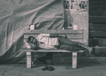 Man sleeping on bench