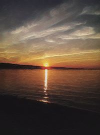 Scenic view of sea at sunset