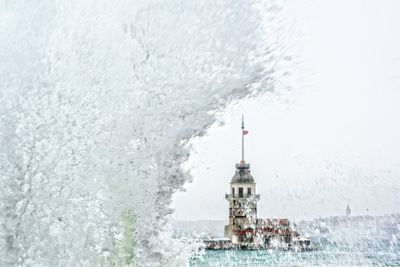 Scenic view of tower against sky