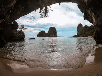 Rocks on sea against sky