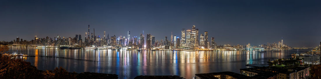 Illuminated buildings in city at night