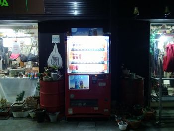 Close-up of store at night