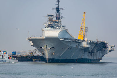 Ship in sea against clear sky