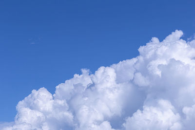 Low angle view of cloudscape against blue sky