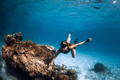 Man swimming in sea