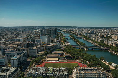 Buildings skyline and river seine seen from the eiffel tower in paris. the famous capital of france.