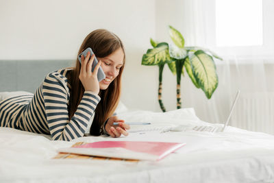 Businesswoman working on table