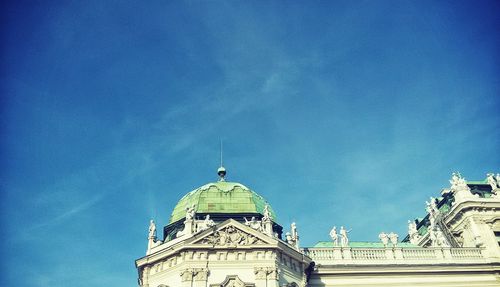 Low angle view of built structure against blue sky