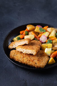 Close-up of food in plate on table