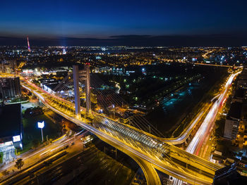 High angle view of illuminated cityscape at night