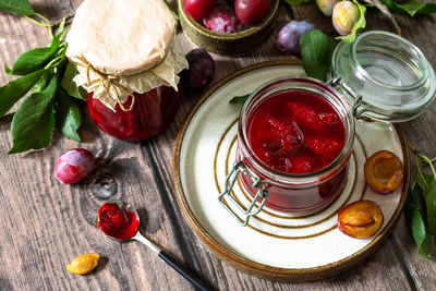 High angle view of fruits in jar on table