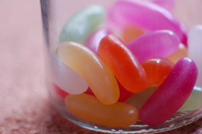 Close-up of jellybeans in glass container