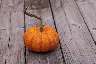 Close-up of pumpkin on wooden table