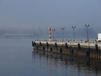 Pier on sea against sky