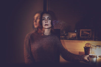 Multiple exposure of woman at home