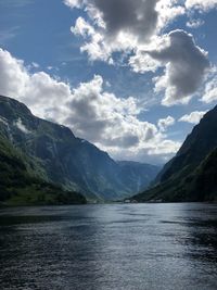 Scenic view of lake and mountains against sky in norway