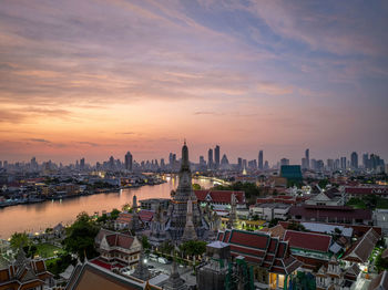 High angle view of townscape against sky during sunset