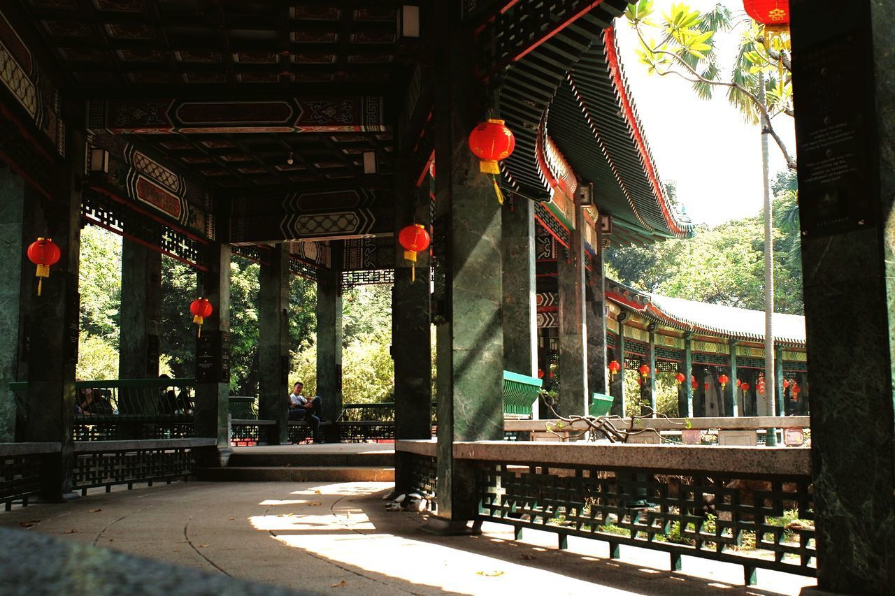 LANTERNS HANGING BY BUILDING