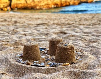 Close-up of painting on sand