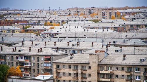 High angle view of residential buildings in city