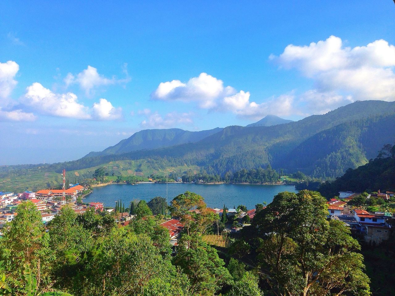 mountain, mountain range, sky, water, tree, scenics, tranquil scene, beauty in nature, tranquility, cloud - sky, nature, lake, cloud, blue, river, growth, landscape, high angle view, sea, plant