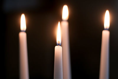 Close-up of illuminated candles