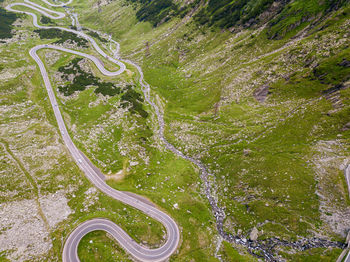 Winding road aerial view by drone. sibii, romania. a great place to drive and stop during a trip.
