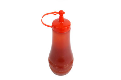 Close-up of bottle against white background