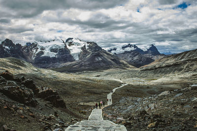 Landscape of the road back and chain of mountains in front of pastoruri glacier