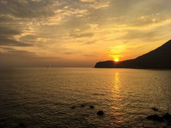 Scenic view of sea against sky during sunset