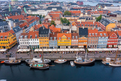 Famous nyhavn pier with colorful buildings and boats in copenhagen, denmark.