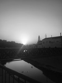 View of bridge over water against clear sky