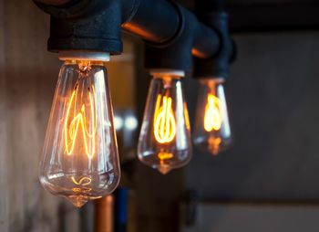 Close-up of illuminated light bulb