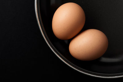 High angle view of eggs in container