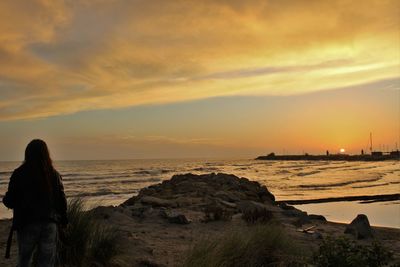 Scenic view of sea at sunset