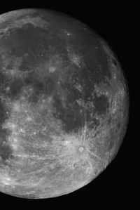 Low angle view of moon against sky at night