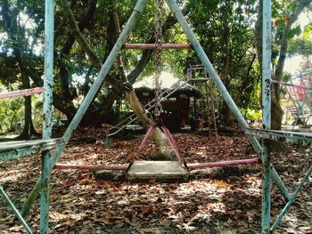 View of metal fence in forest