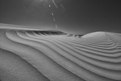 Scenic view of dessert against sky