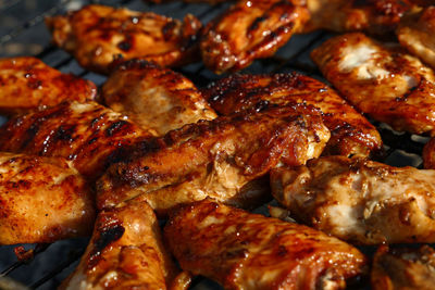 Close-up of meat on barbecue grill