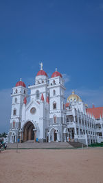 View of historic building against clear blue sky