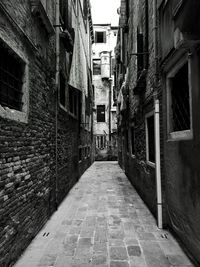 Narrow alley along buildings