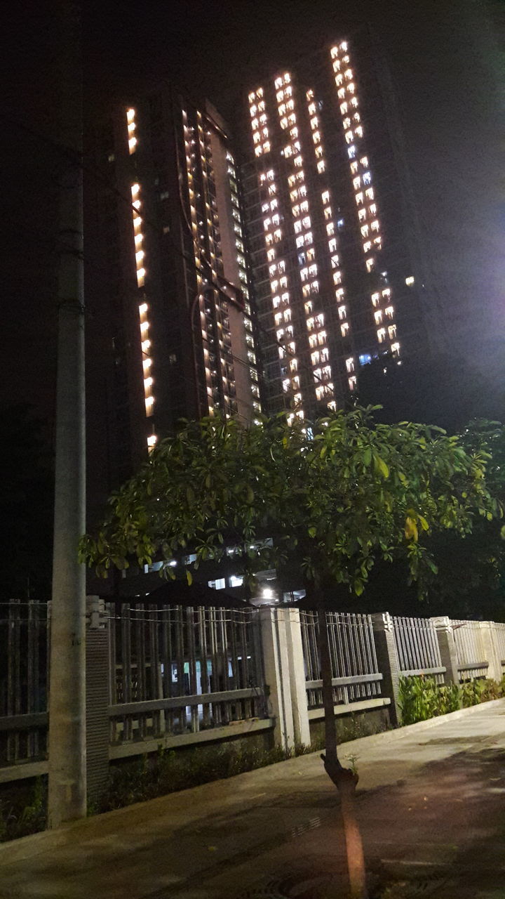 LOW ANGLE VIEW OF ILLUMINATED BUILDING
