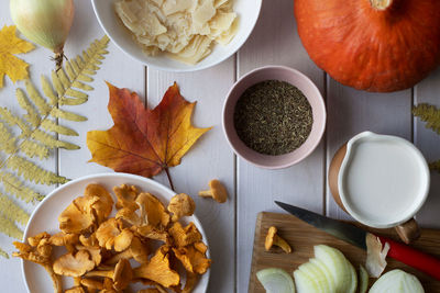 Autumn flat lay with ingredients for finnish mushrooms chanterelle soup