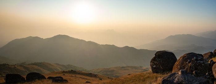 Hands outstretched to receive natural light and mountain views . hipster style. mulayit in myanmar