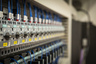 Close-up of electric switchboard in factory