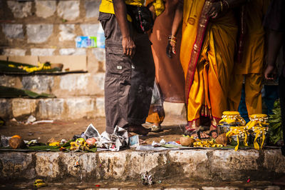 Low section of people standing at temple