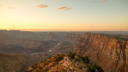 Scenic view of landscape against sky during sunset