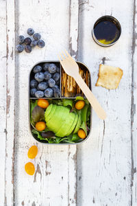 High angle view of fruits in container on table