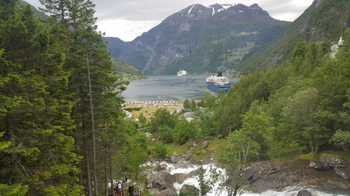 Scenic view of sea with mountains in background